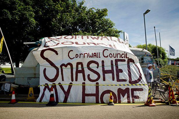 Neil Wainwright's mobile home, which he claims was smashed by Cornwall Council when they moved it Neil Wainwright's mobile home, which he claims was smashed by Cornwall Council when they moved it